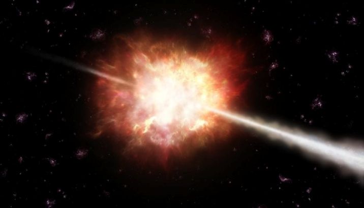 Wizja artystyczna wybuchu gwiazdy prowadzącego do emisji błysku promieniowania gamma (za ESO/A. Roquette)